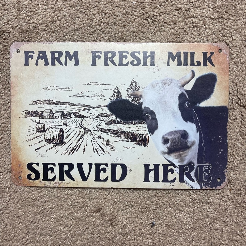 Metal sign. Farm Fresh milk served here